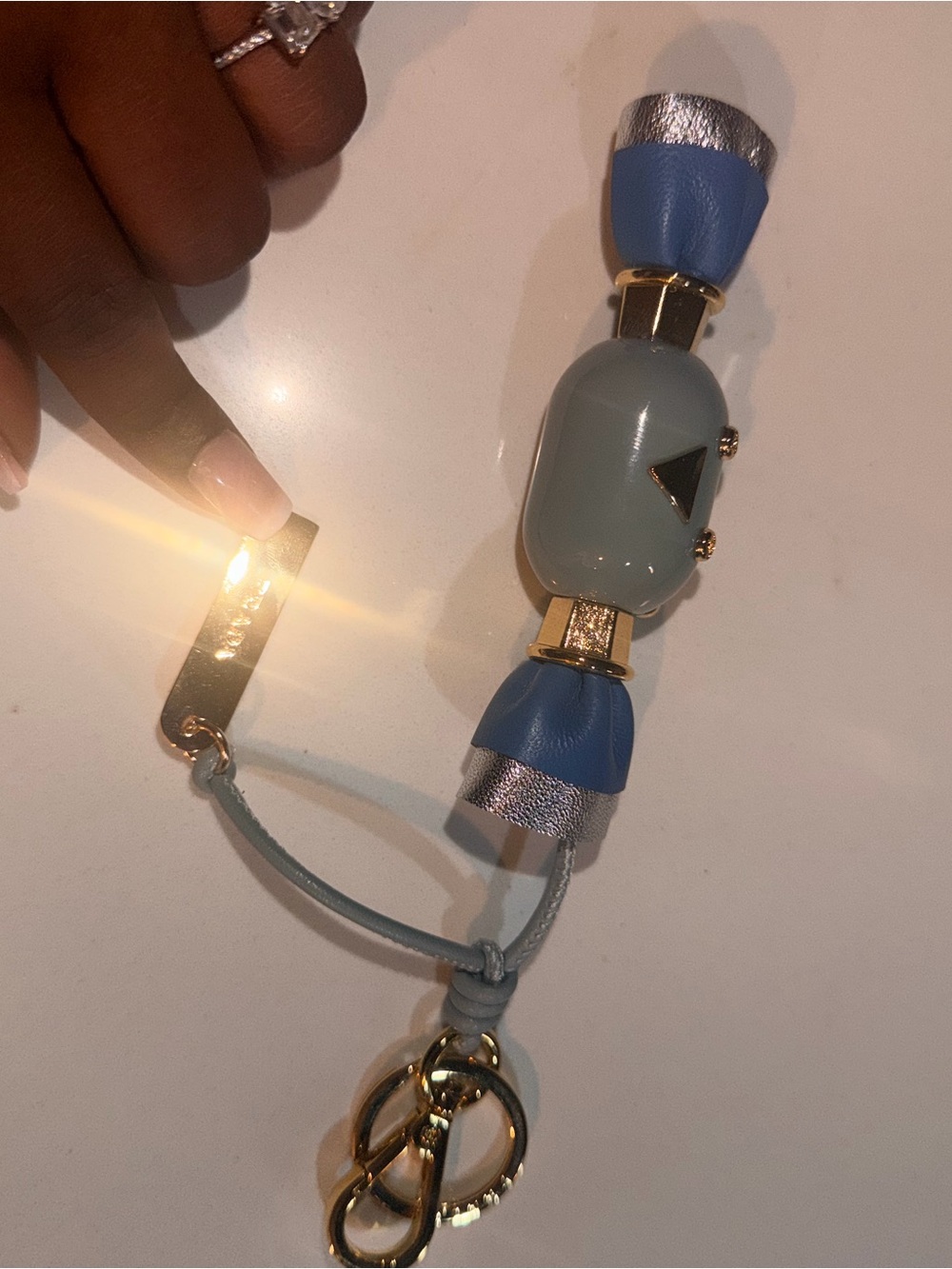 Prada Kids Light Blue Leather Charm Keychain with Gold Accents - Picture 6 of 6